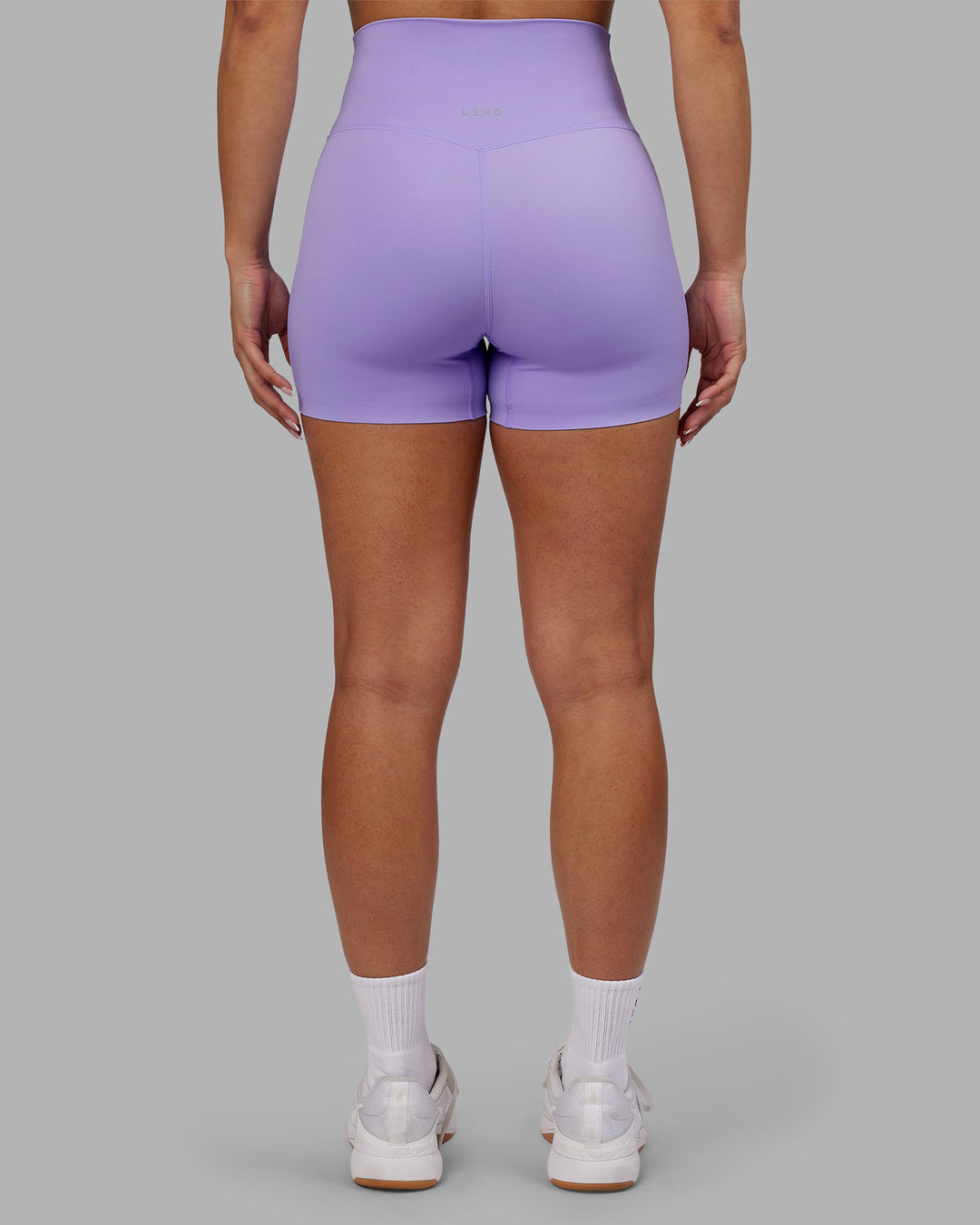 Woman wearing Elixir Ultra High-Rise 4" Short - Violet Ray | Model:Ayla | Size:S