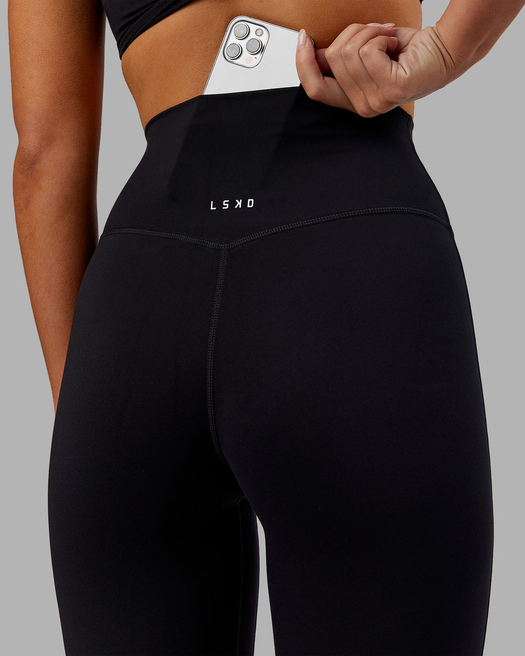 Woman wearing Elixir Ultra High-Rise 7/8 Legging - Black | Model:Kirstyn | Size:S