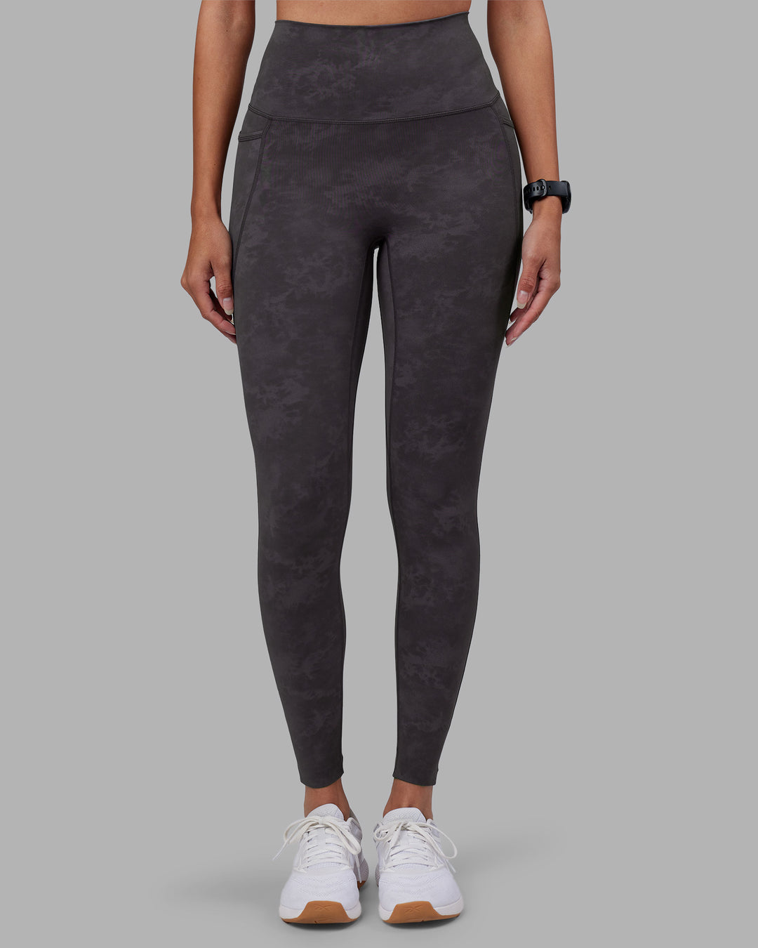 Woman wearing Elixir Ultra High-Rise Full Length Legging Pockets - Dark Storm Wash | Model:Rhiley | Size:S