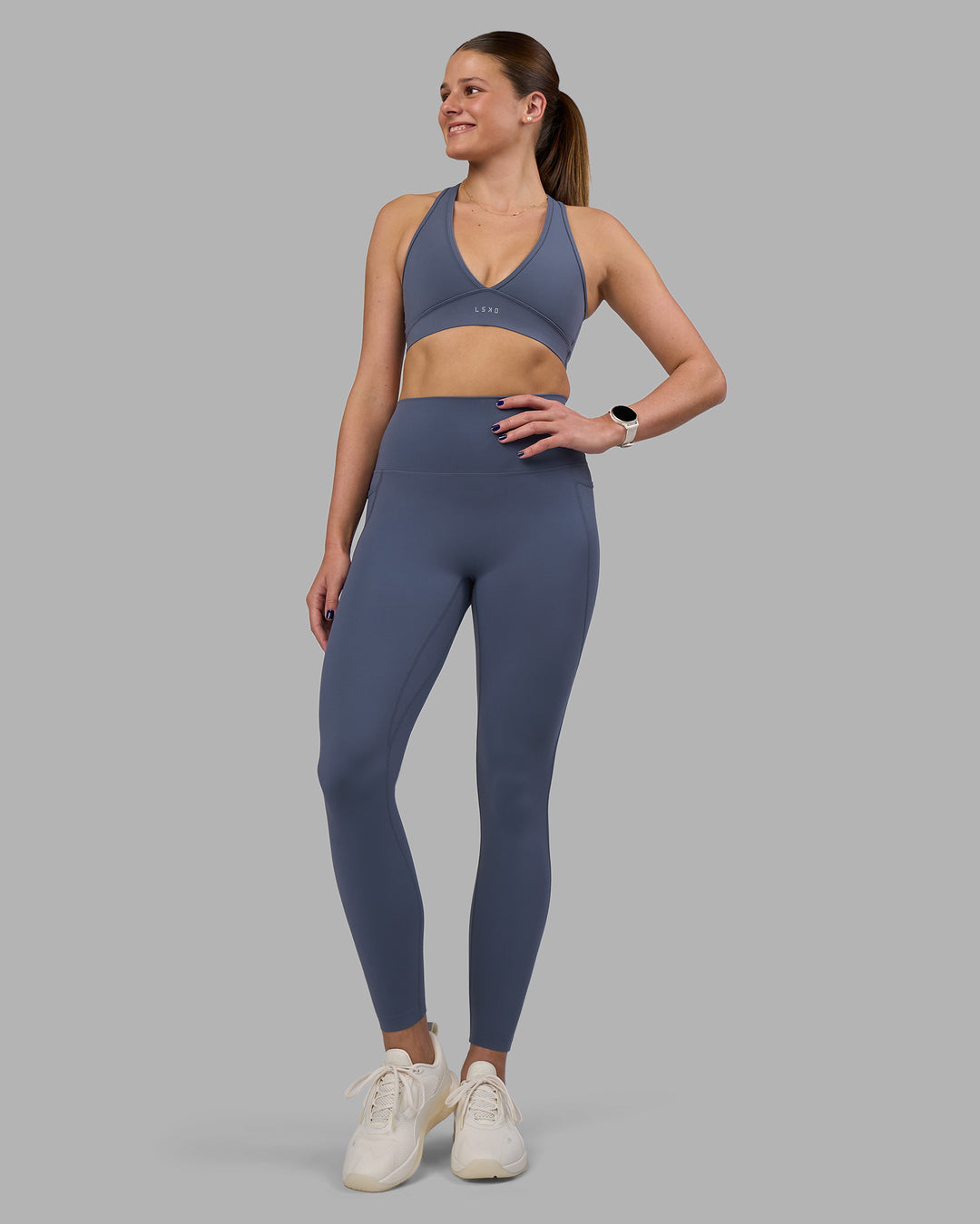 Woman wearing Elixir Ultra High-Rise Full Length Legging Pockets - Night Shadow | Model:Phoebe | Size:S
