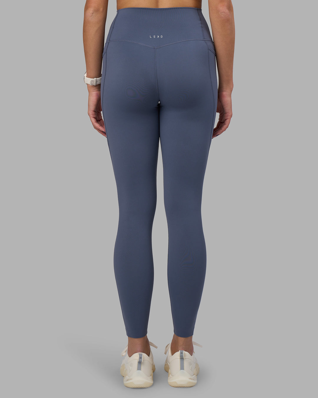 Woman wearing Elixir Ultra High-Rise Full Length Legging Pockets - Night Shadow | Model:Phoebe | Size:S