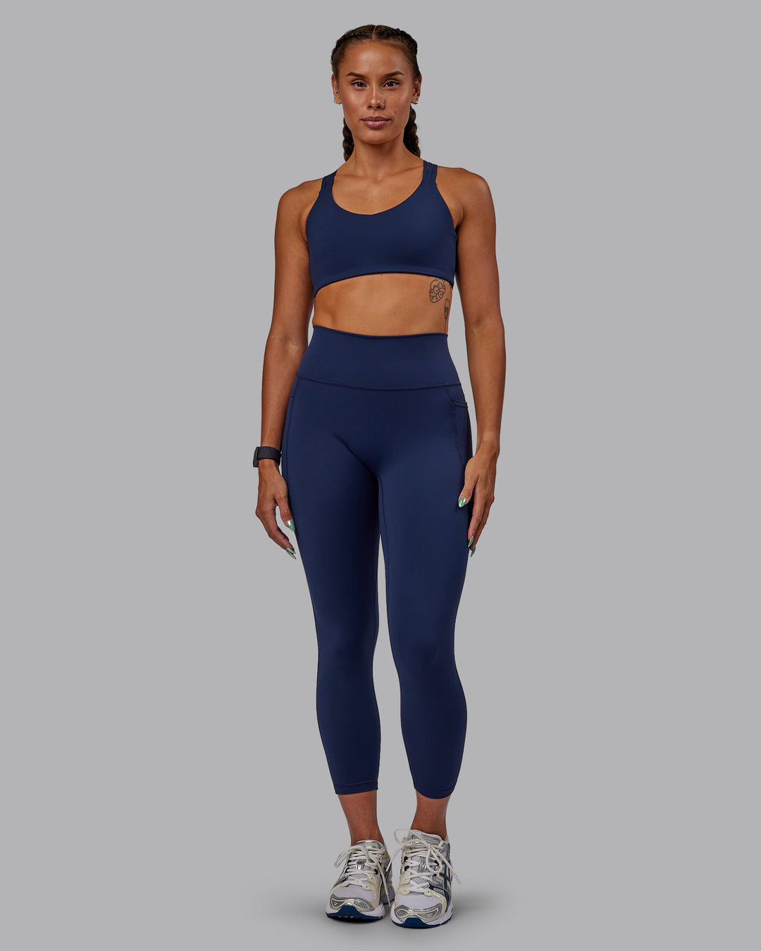 Woman wearing Fusion Ultra High-Rise 7/8 Legging Pockets - Future Navy | Model:Vanessa | Size:S