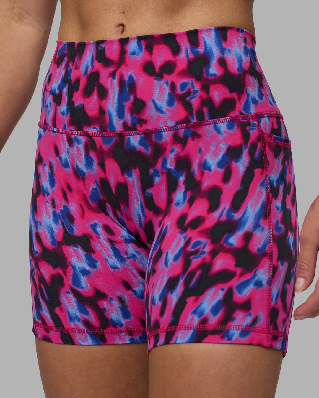 Woman wearing Fusion High-Rise 6" Short Pockets - Pink Luminous | Model:Hannah | Size:S
