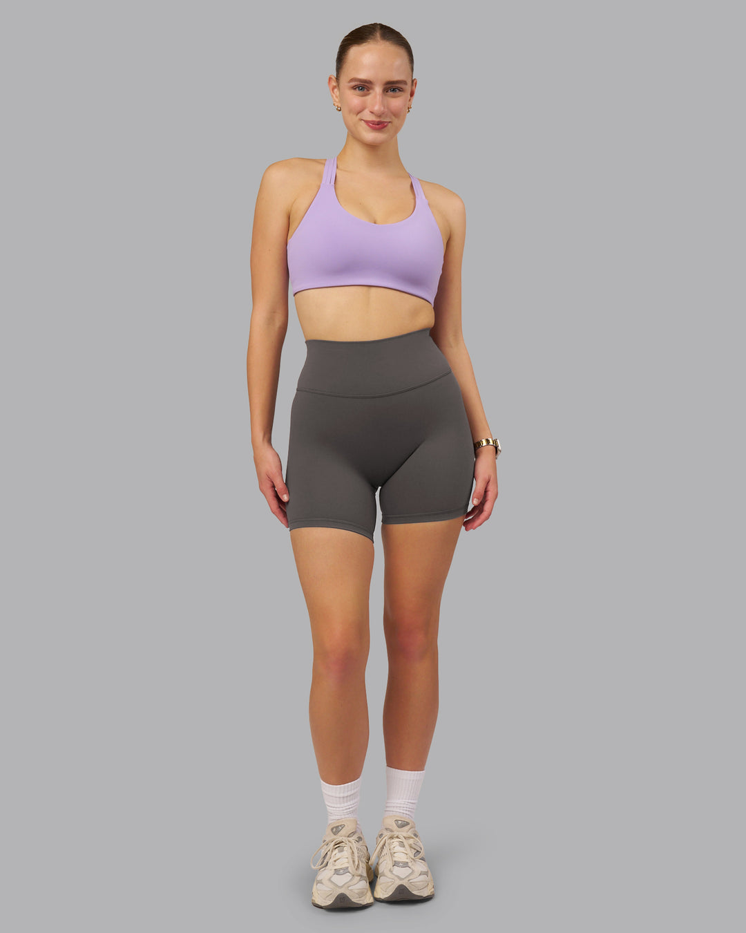 Woman wearing Fusion Ultra High-Rise 6" Short - Dark Storm | Model:Lillie | Size:S