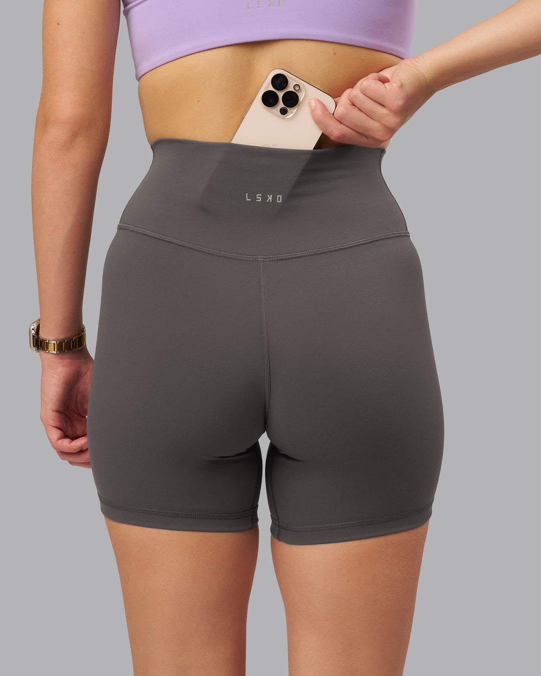 Woman wearing Fusion Ultra High-Rise 6" Short - Dark Storm | Model:Lillie | Size:S