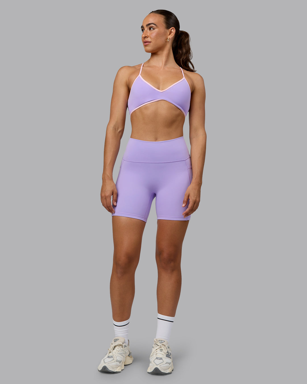 Woman wearing Fusion Ultra High-Rise 6" Short Pockets - Pale Lilac | Model:Sophie | Size:S