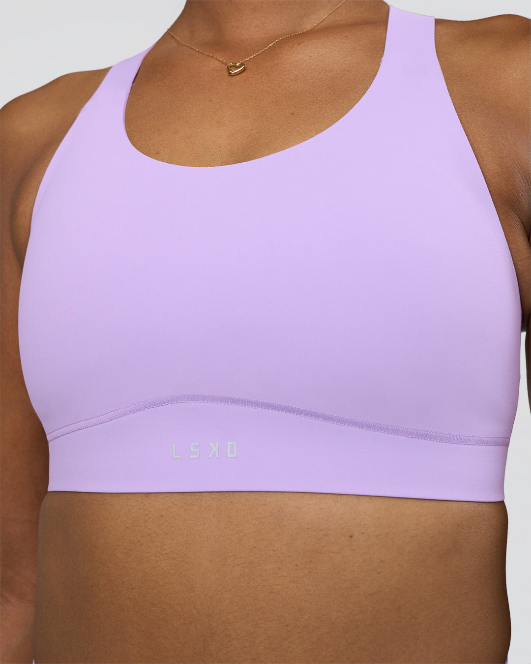 Woman wearing Fusion Sports Bra 2.0 - Pale Lilac | Model:Rica | Size:S
