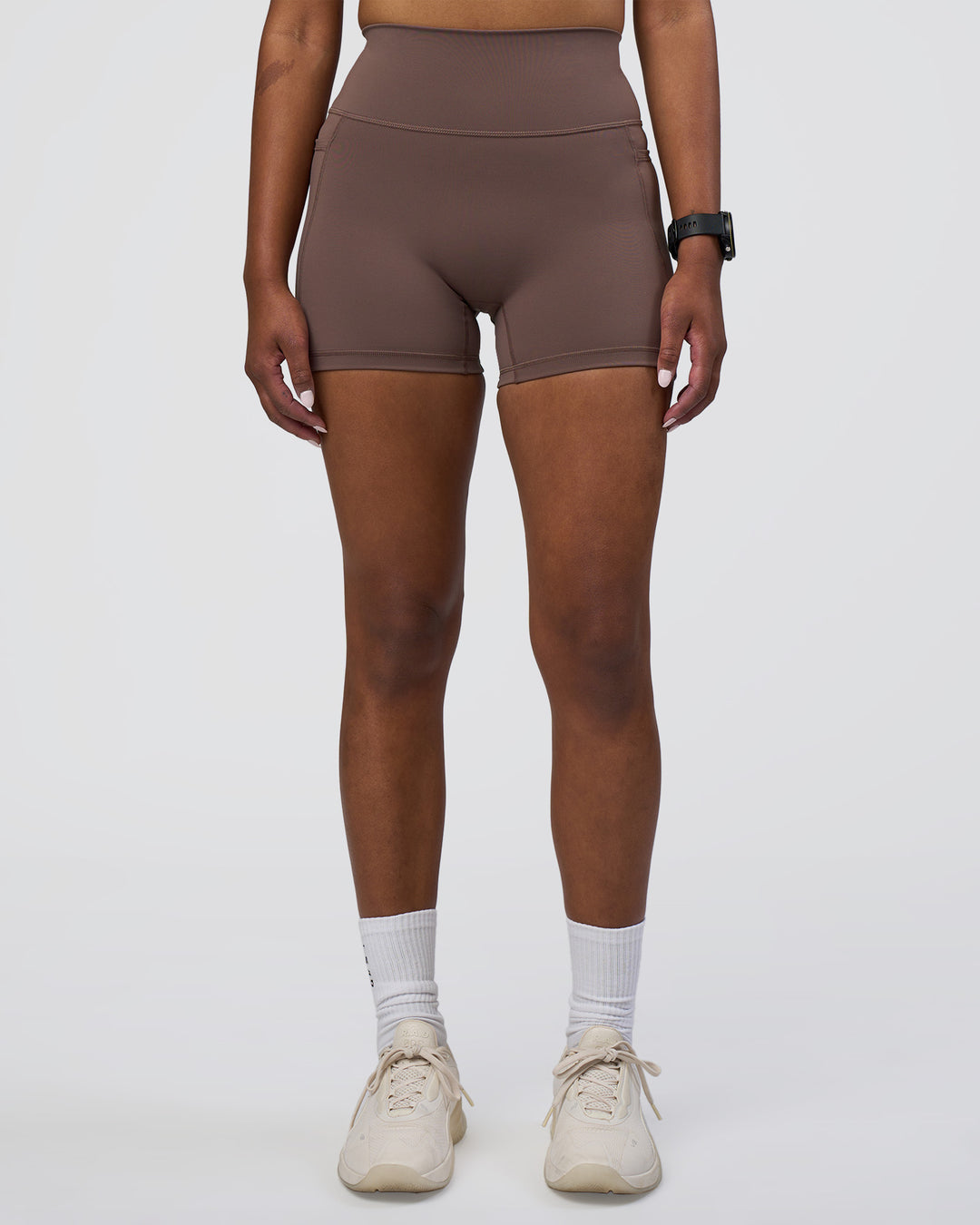 Woman wearing Fusion Ultra High-Rise 4" Short Pockets - Peppercorn | Model:Rica | Size:S
