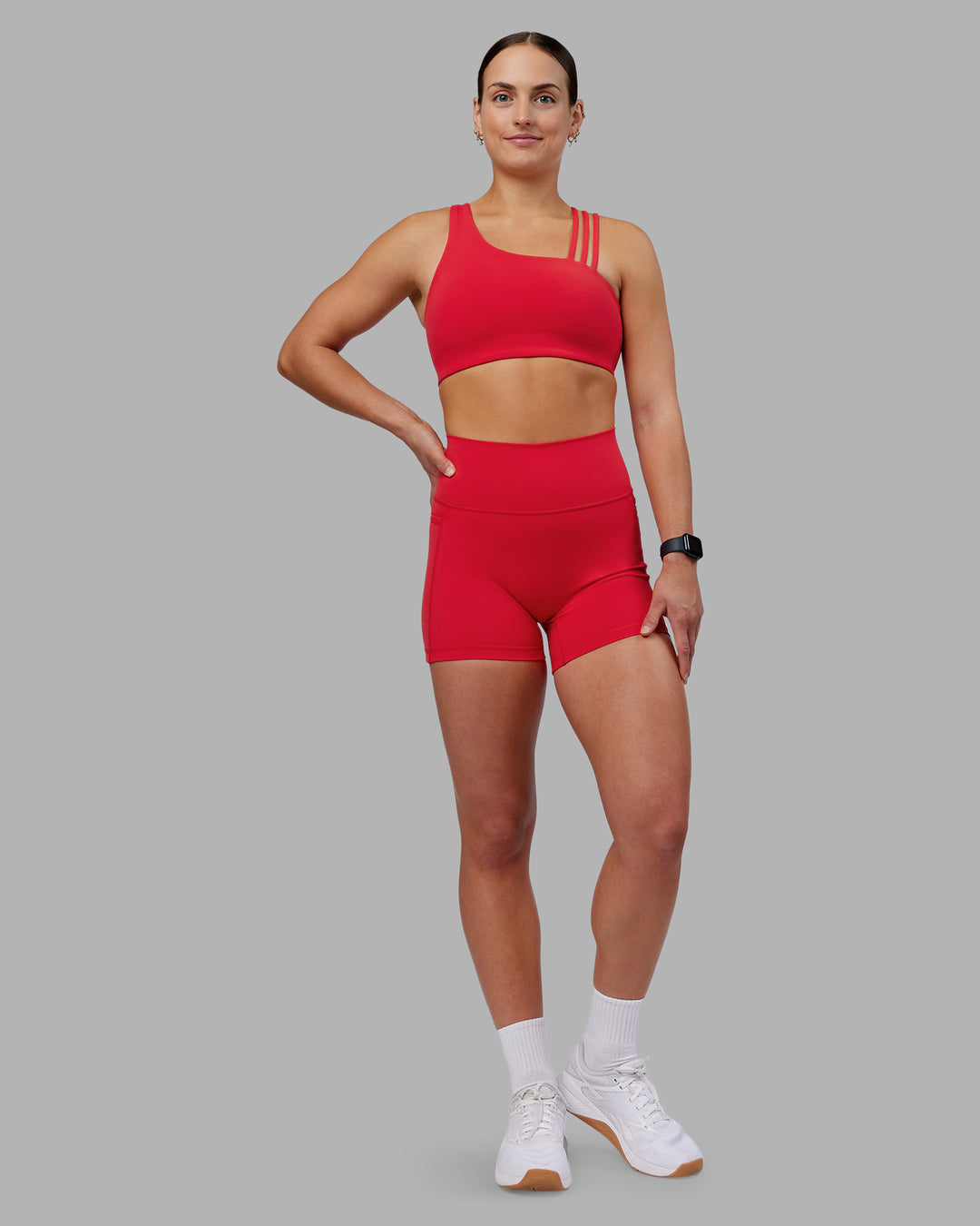 Woman wearing Fusion Ultra High-Rise 4" Short Pockets - Scarlet | Model:Keisha | Size:S