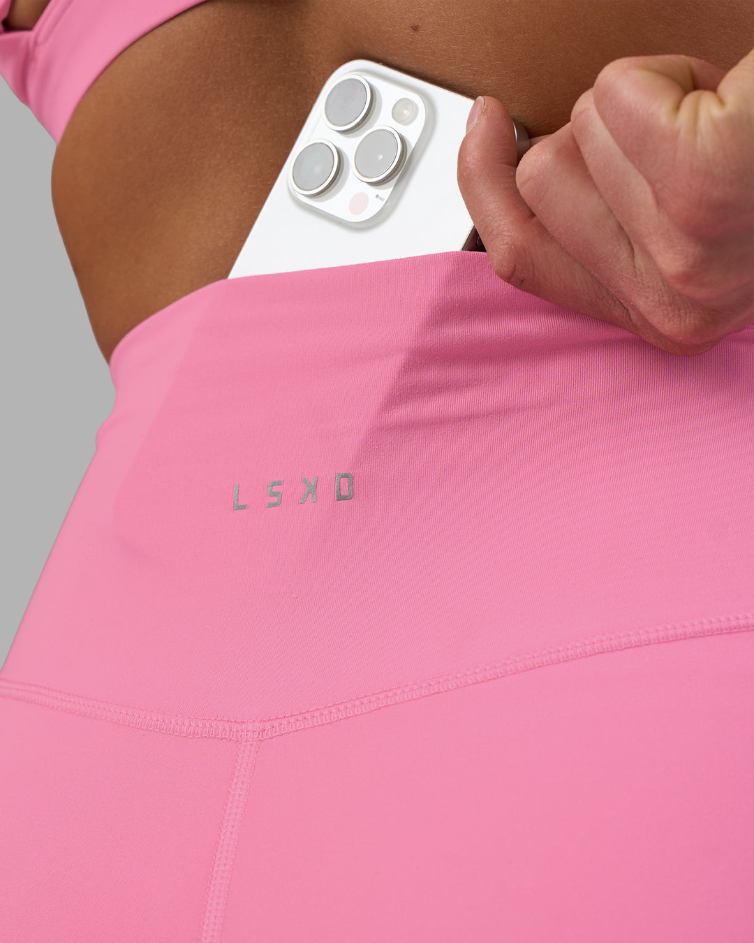 Woman wearing Fusion Ultra High-Rise 6" Short - Candy Pink | Model:Keisha | Size:S