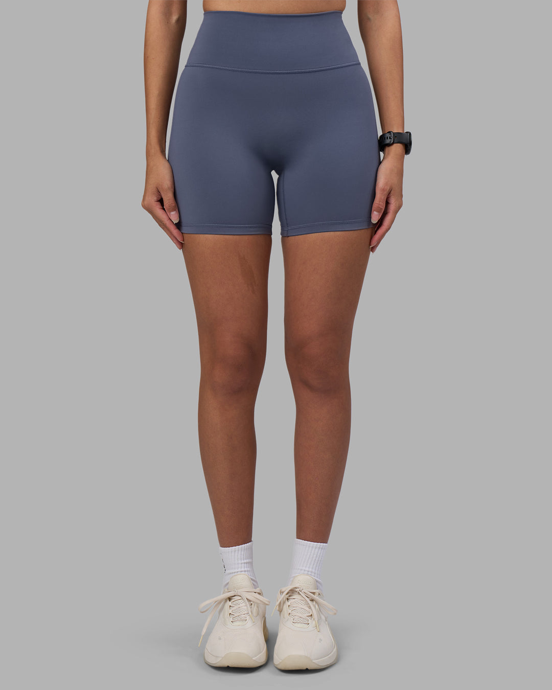Woman wearing Fusion Ultra High-Rise 6" Short - Night Shadow | Model:Rhiley | Size:S
