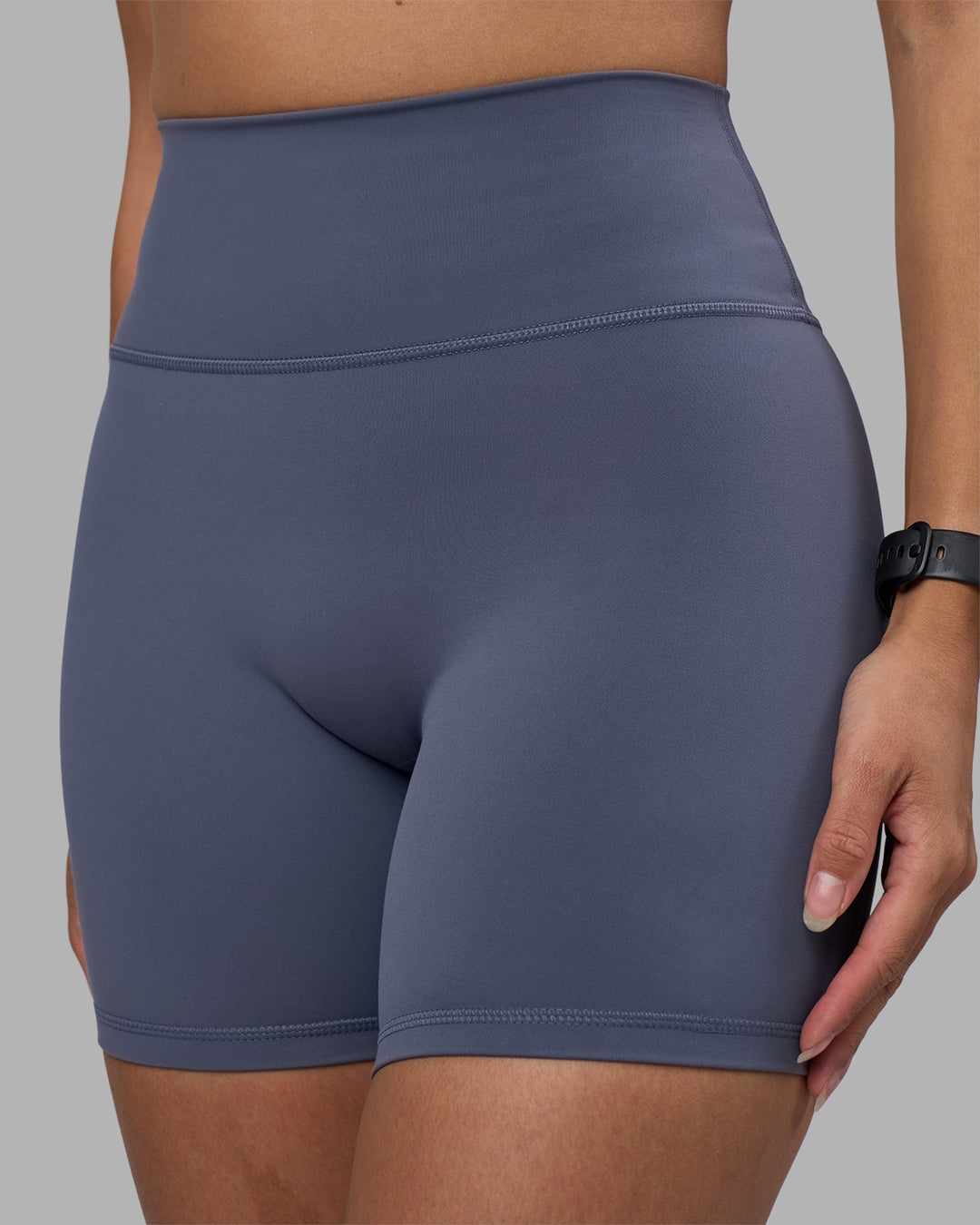Woman wearing Fusion Ultra High-Rise 6" Short - Night Shadow | Model:Rhiley | Size:S