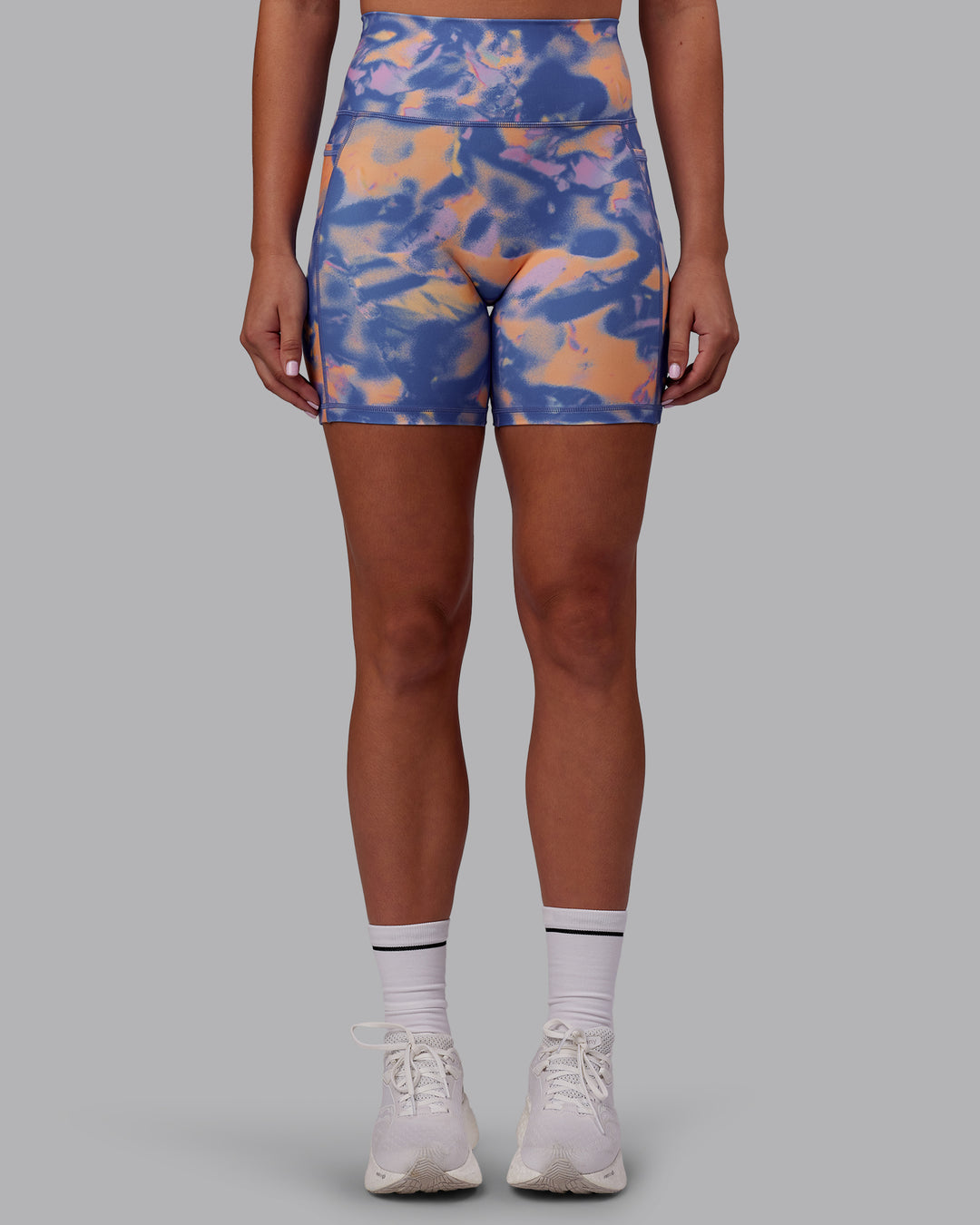Woman wearing Fusion Ultra High-Rise 6" Short Pockets - Apricot Mist | Model:Charlize | Size:S