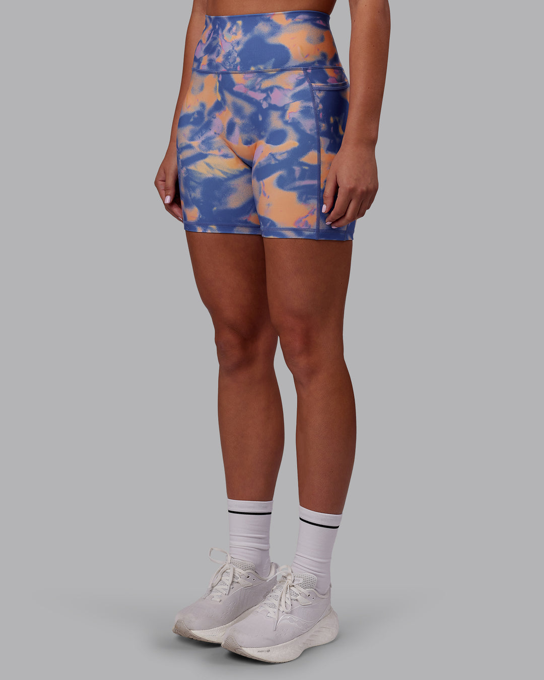 Woman wearing Fusion Ultra High-Rise 6" Short Pockets - Apricot Mist | Model:Charlize | Size:S
