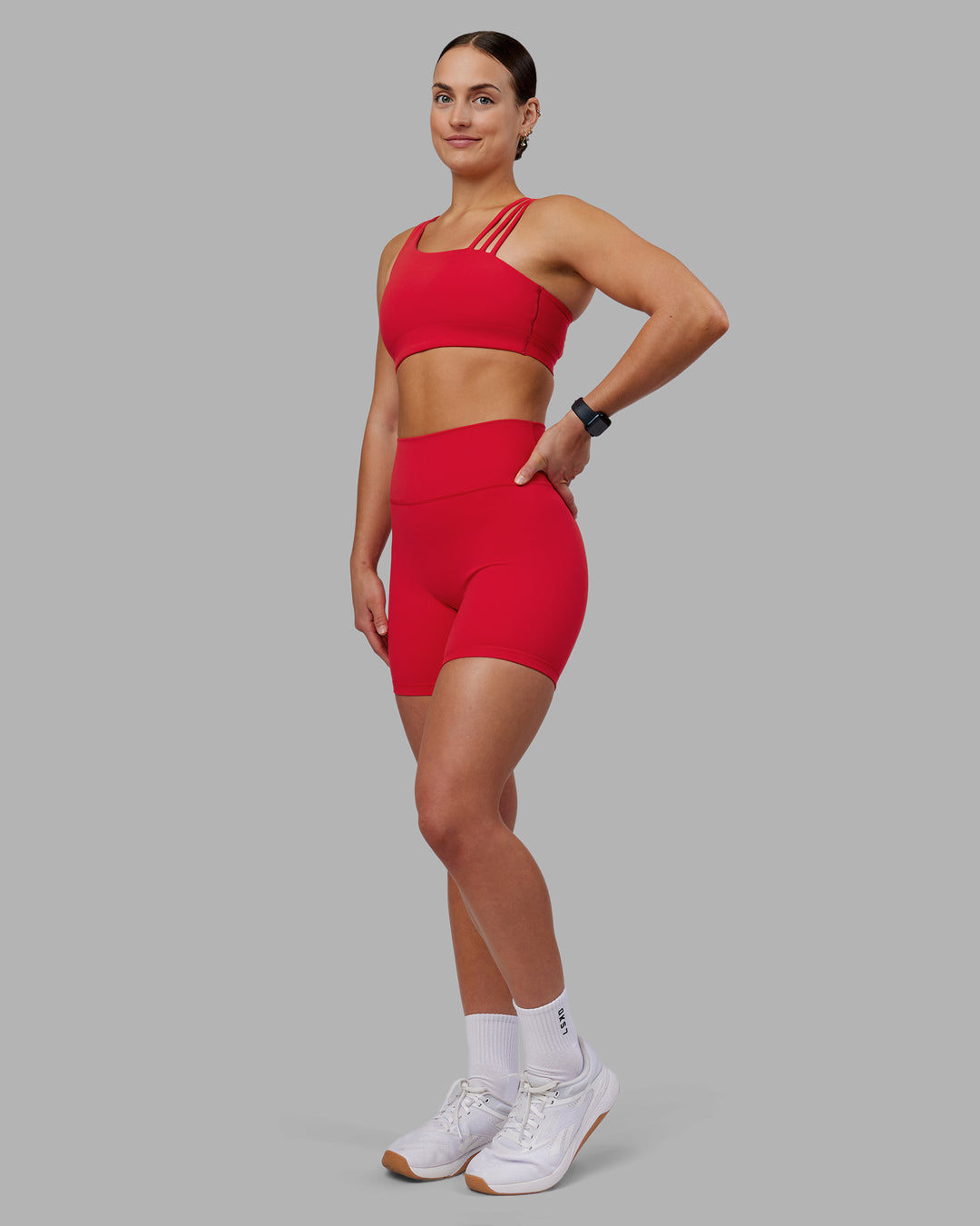 Woman wearing Fusion Ultra High-Rise 6" Short - Scarlet | Model:Keisha | Size:S