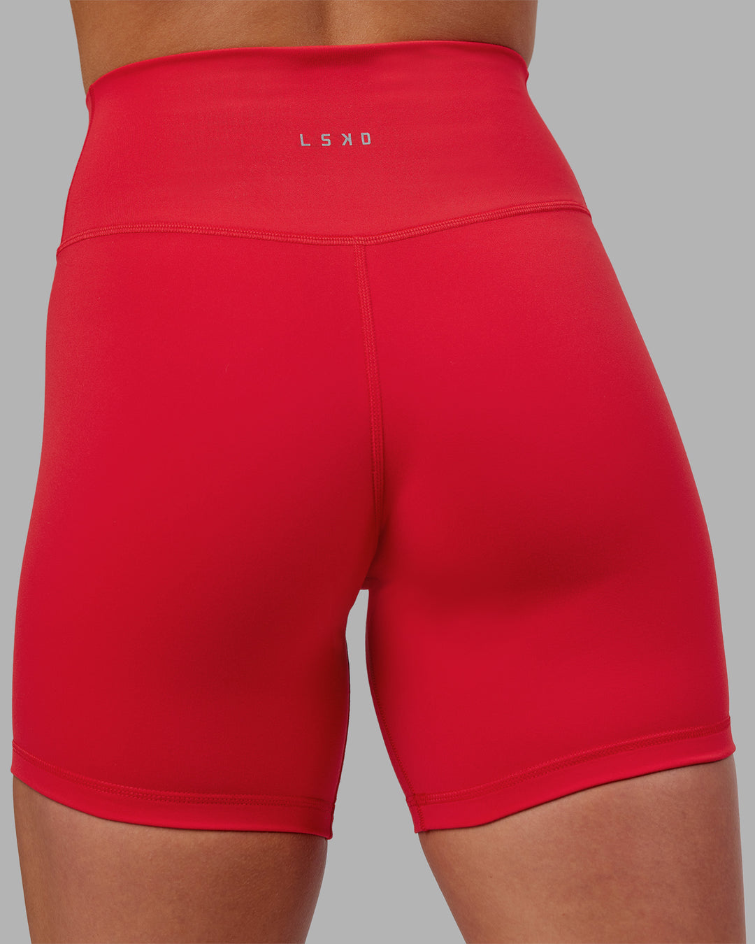 Woman wearing Fusion Ultra High-Rise 6" Short - Scarlet | Model:Keisha | Size:S