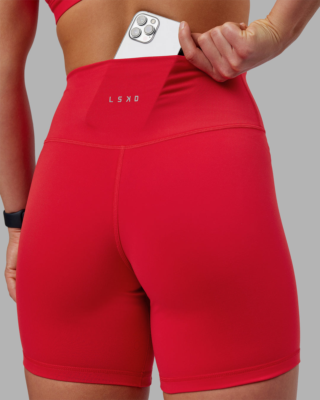 Woman wearing Fusion Ultra High-Rise 6" Short - Scarlet | Model:Keisha | Size:S