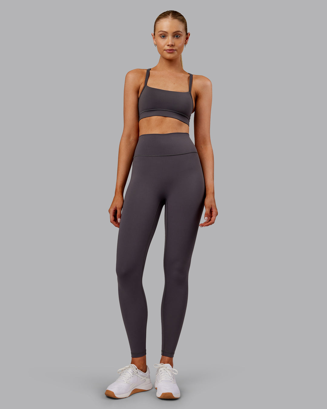 Woman wearing Fusion Ultra High-Rise Full Length Legging - Dark Storm | Model:Ella | Size:S
