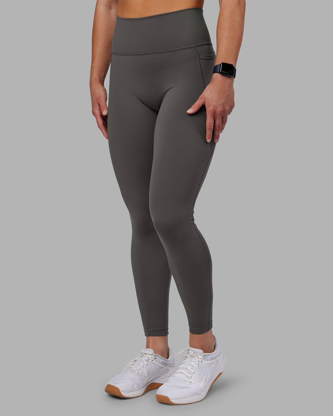 Woman wearing Fusion Ultra High-Rise Full Length Legging Pockets - Dark Storm | Model:Keisha | Size:S