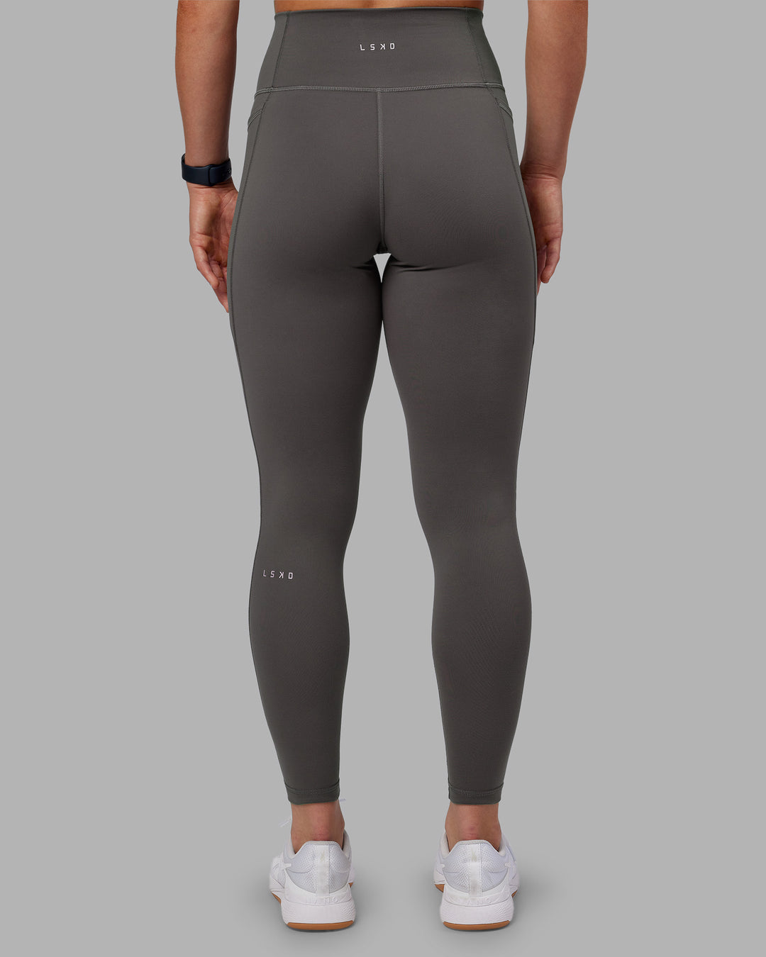 Woman wearing Fusion Ultra High-Rise Full Length Legging Pockets - Dark Storm | Model:Keisha | Size:S