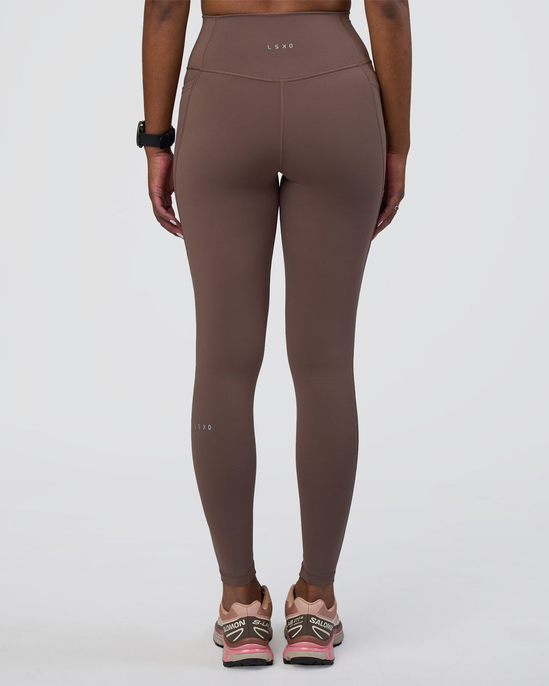 Woman wearing Fusion Ultra High-Rise Full Length Legging Pockets - Peppercorn | Model:Rica | Size:S
