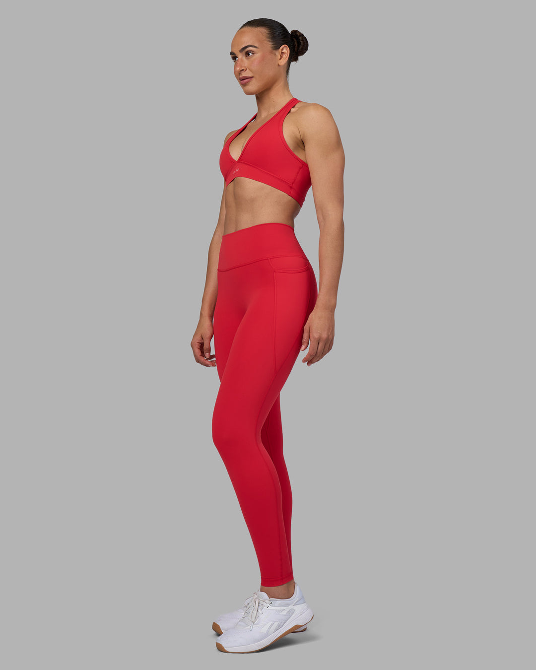 Woman wearing Fusion Ultra High-Rise Full Length Legging Pockets - Scarlet | Model:Sophie | Size:S