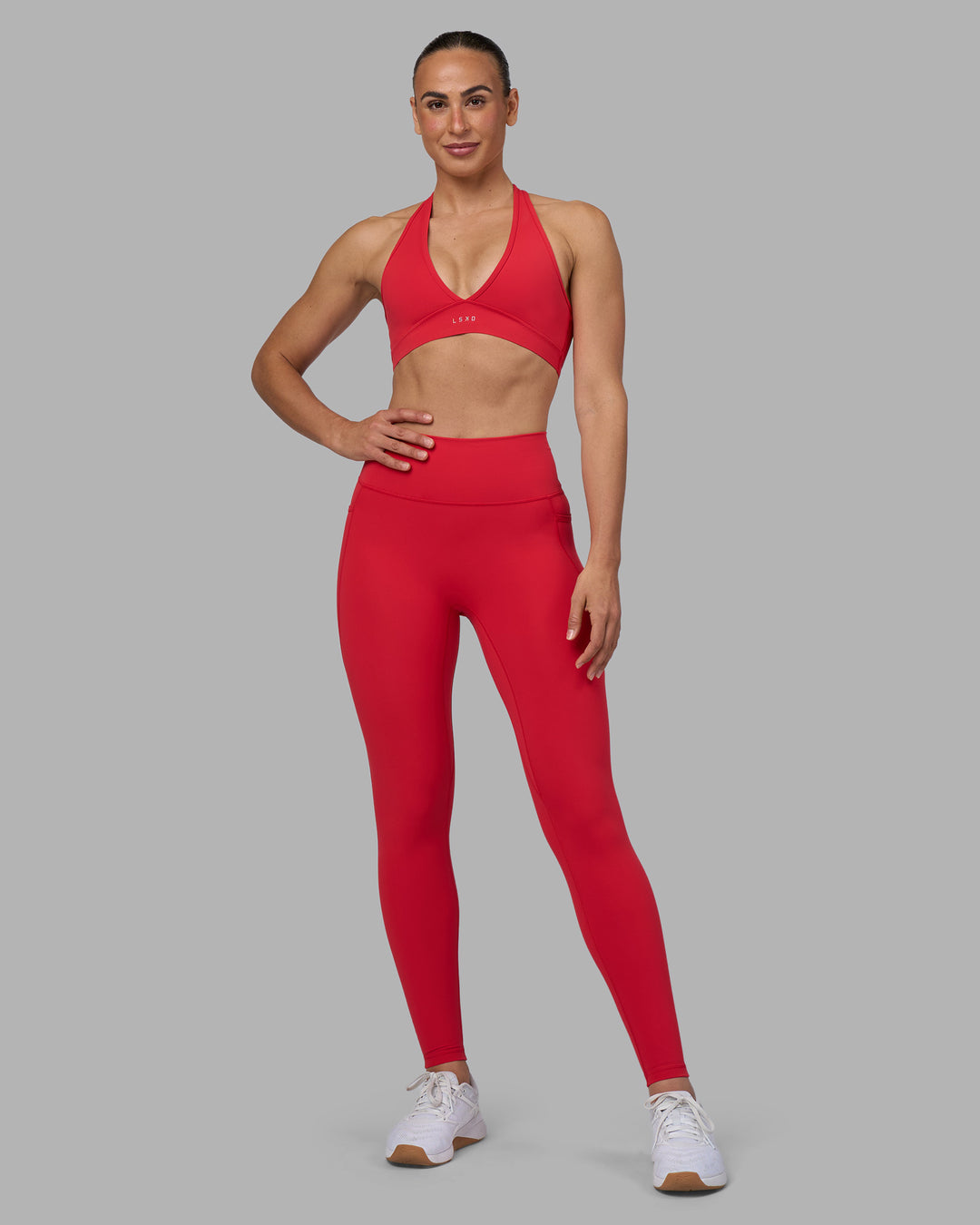 Woman wearing Fusion Ultra High-Rise Full Length Legging Pockets - Scarlet | Model:Sophie | Size:S