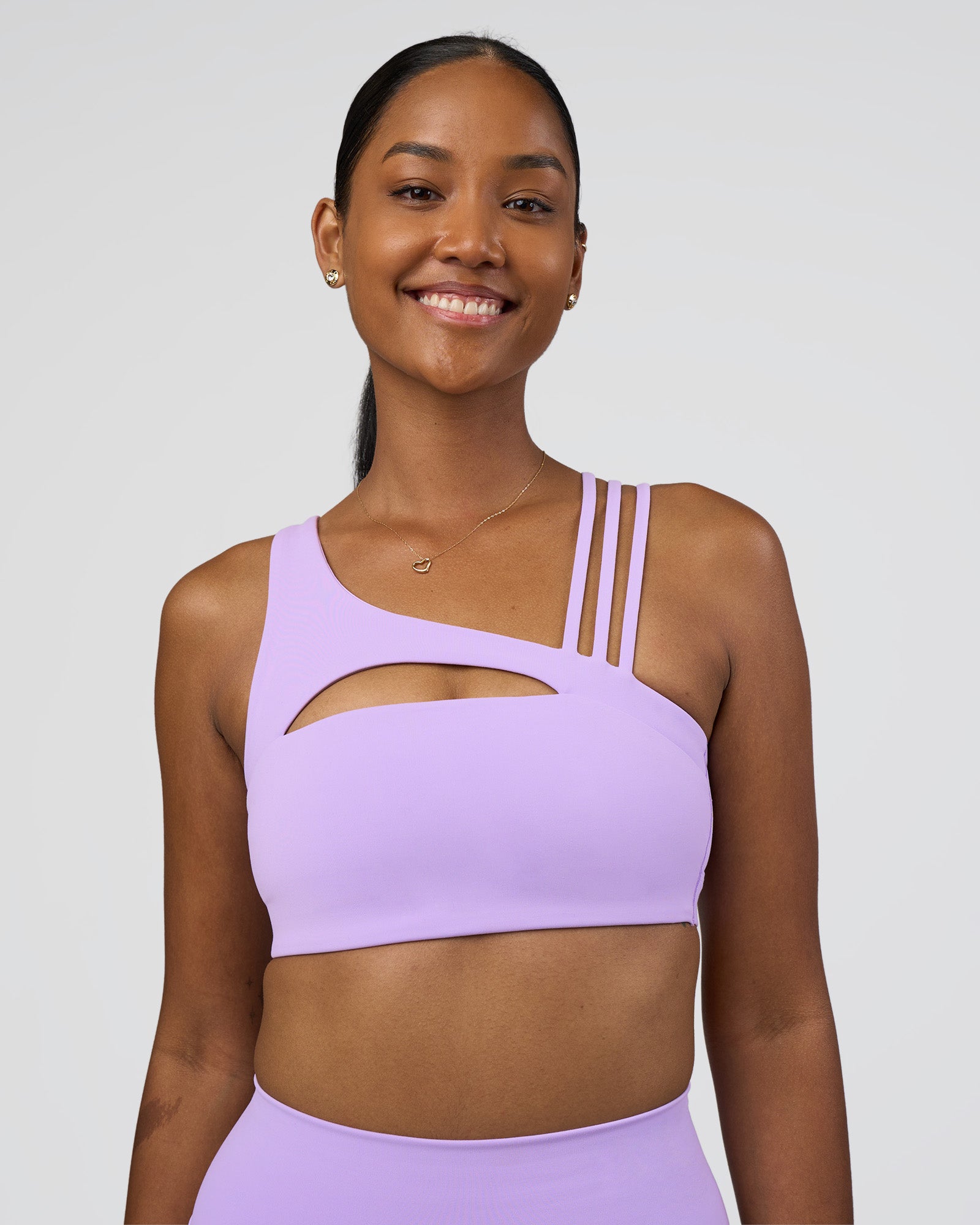 Woman wearing Galvanise Splice Sports Bra - Pale Lilac | Model:Rica | Size:S
