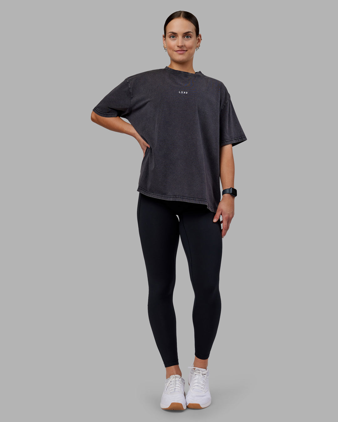 Woman wearing Go-To FLXCotton Oversized Tee - Black Washed-White | Model:Keisha | Size:S