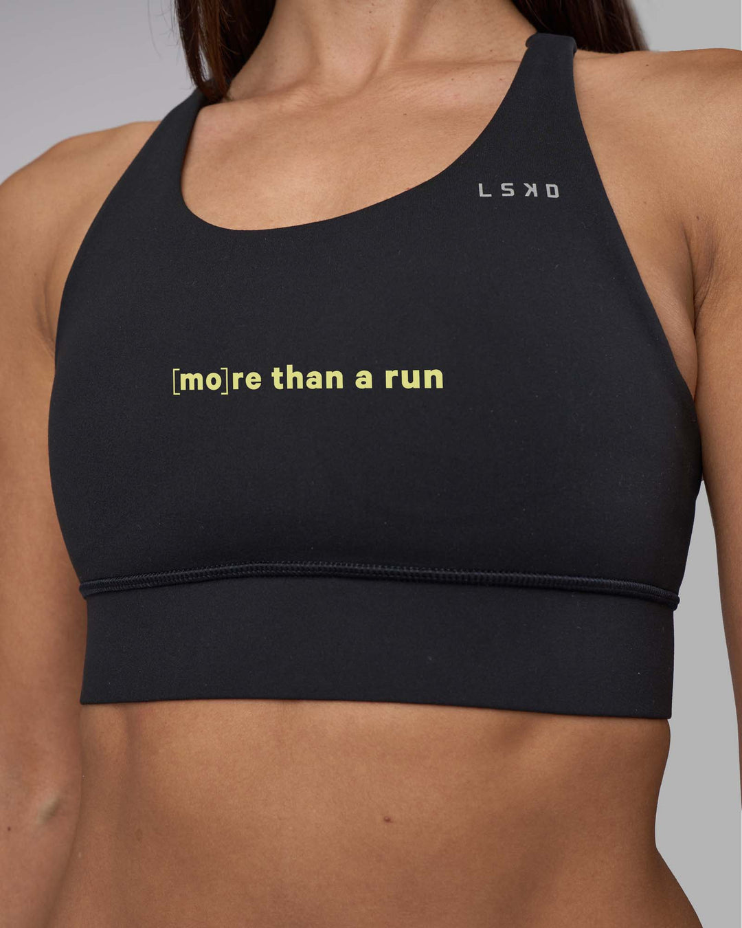 Woman wearing MTAR Accelerate Sports Bra - Black | Model:Rhiley | Size:S