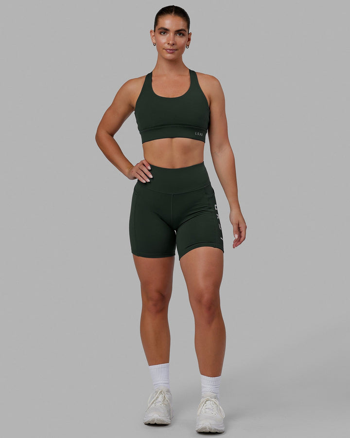 Woman wearing MVP 2.0 Sports Bra - Vital Green