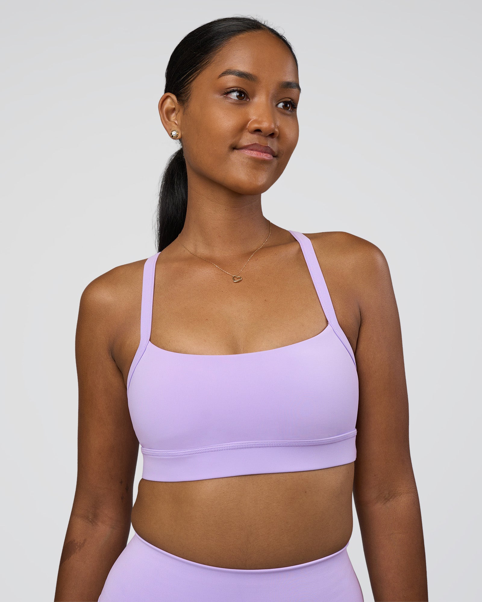 Woman wearing Momentum Sports Bra - Pale Lilac | Model:Rica | Size:S