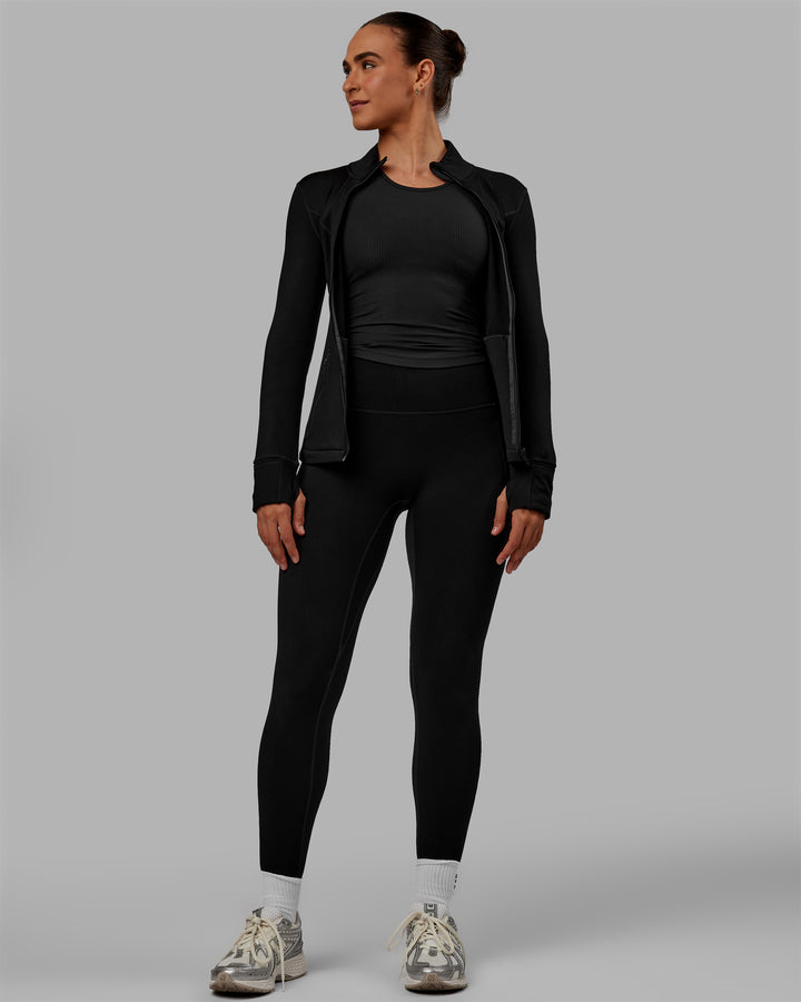 Woman wearing Motion Full Length Thermal Leggings - Black