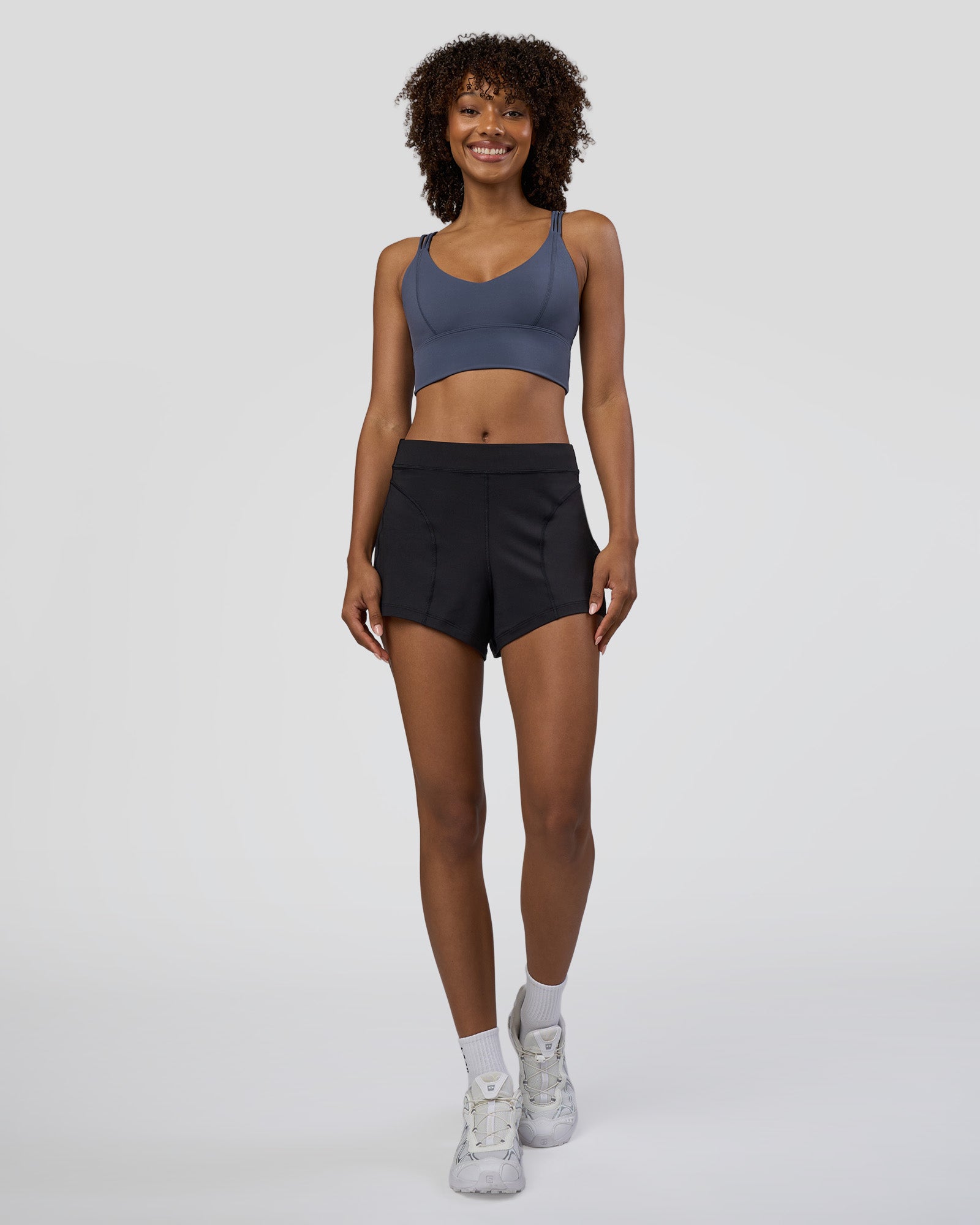 Woman wearing Movement CloudFLX 3" Short - Black | Model:Tomi | Size:S