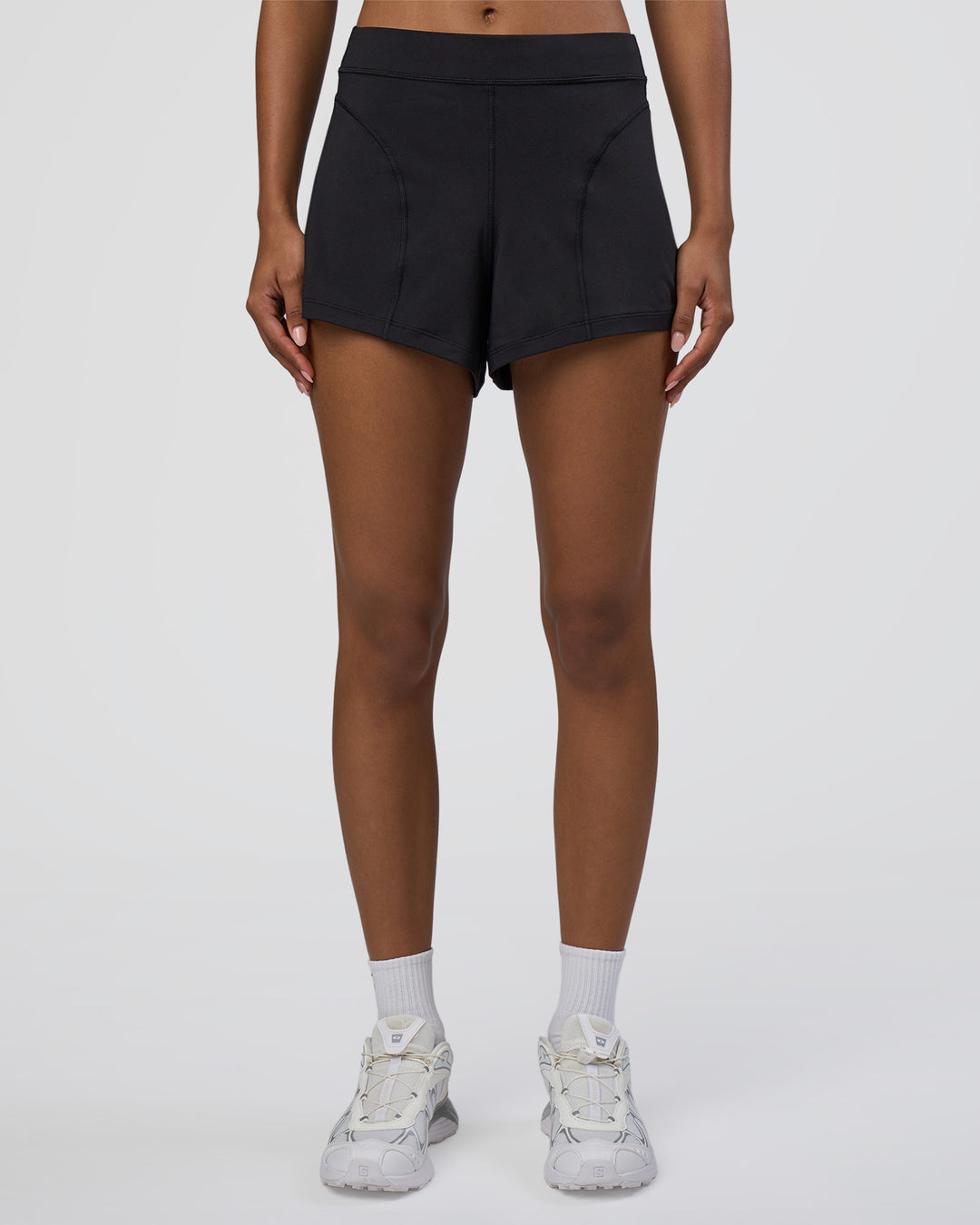 Woman wearing Movement CloudFLX 3" Short - Black | Model:Tomi | Size:S