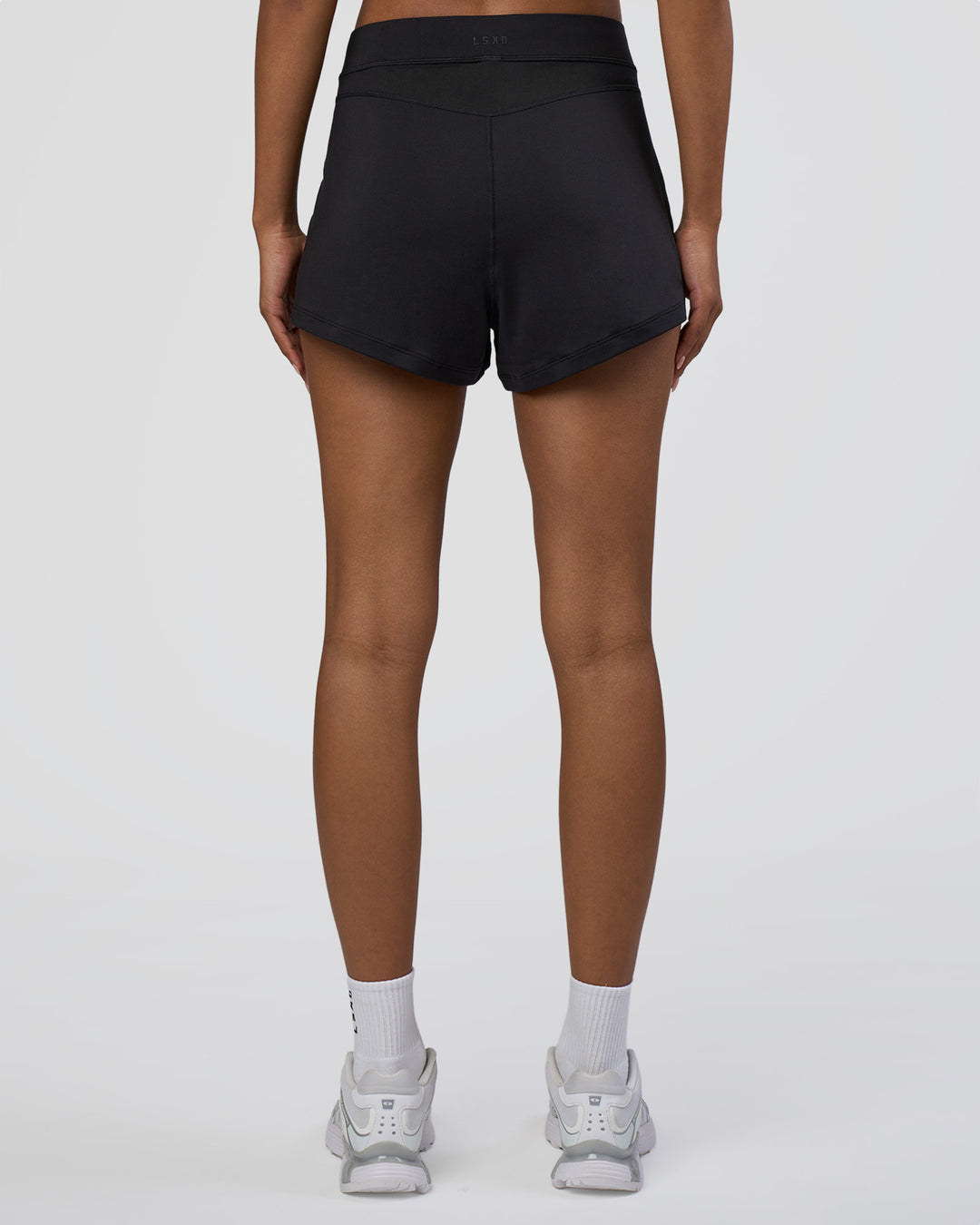 Woman wearing Movement CloudFLX 3" Short - Black | Model:Tomi | Size:S