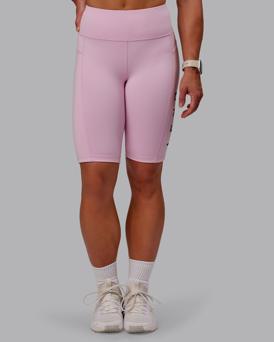 Woman wearing Rep Ultra High-Rise 9" Short Pockets - Marshmallow-Cherry Lacquer | Model:Amber | Size:S