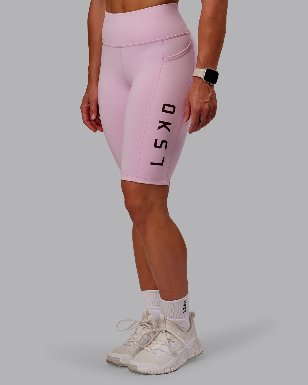 Woman wearing Rep Ultra High-Rise 9" Short Pockets - Marshmallow-Cherry Lacquer | Model:Amber | Size:S