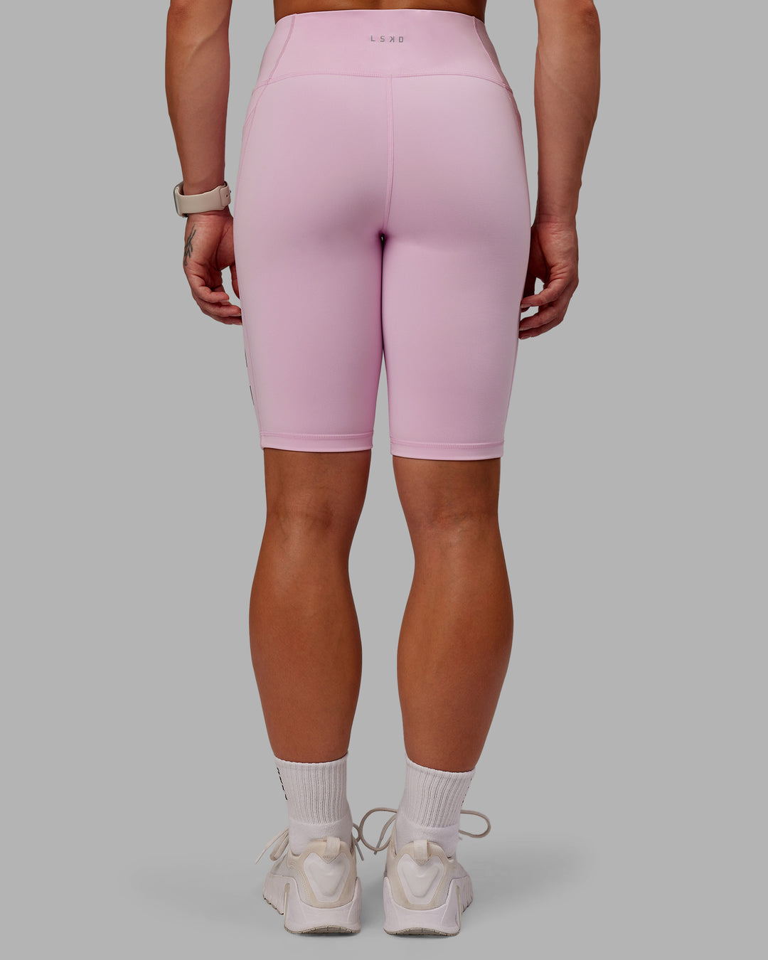 Woman wearing Rep Ultra High-Rise 9" Short Pockets - Marshmallow-Cherry Lacquer | Model:Amber | Size:S