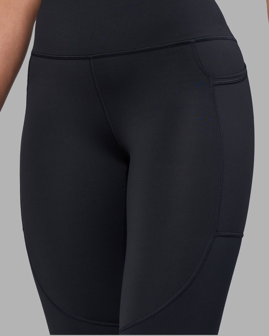 Woman wearing Rep Ultra High-Rise Full Length Legging Pockets - Black-Blue Atoll | Model:Sophie | Size:S