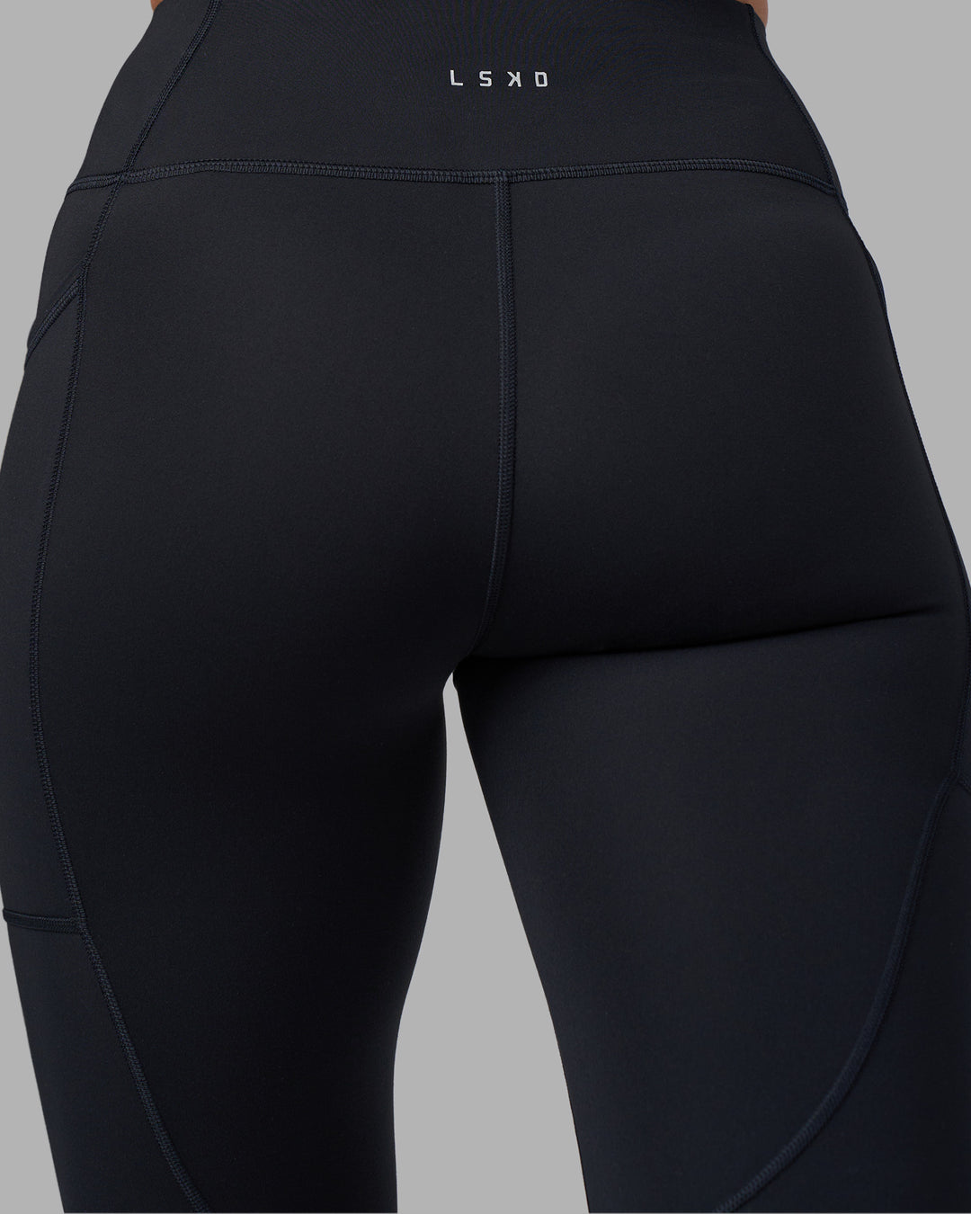 Woman wearing Rep Ultra High-Rise Full Length Legging Pockets - Black-Blue Atoll | Model:Sophie | Size:S
