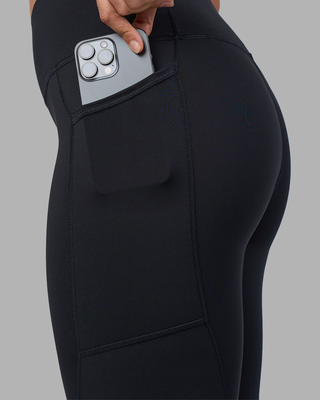 Woman wearing Rep Ultra High-Rise Full Length Legging Pockets - Black-Blue Atoll | Model:Sophie | Size:S