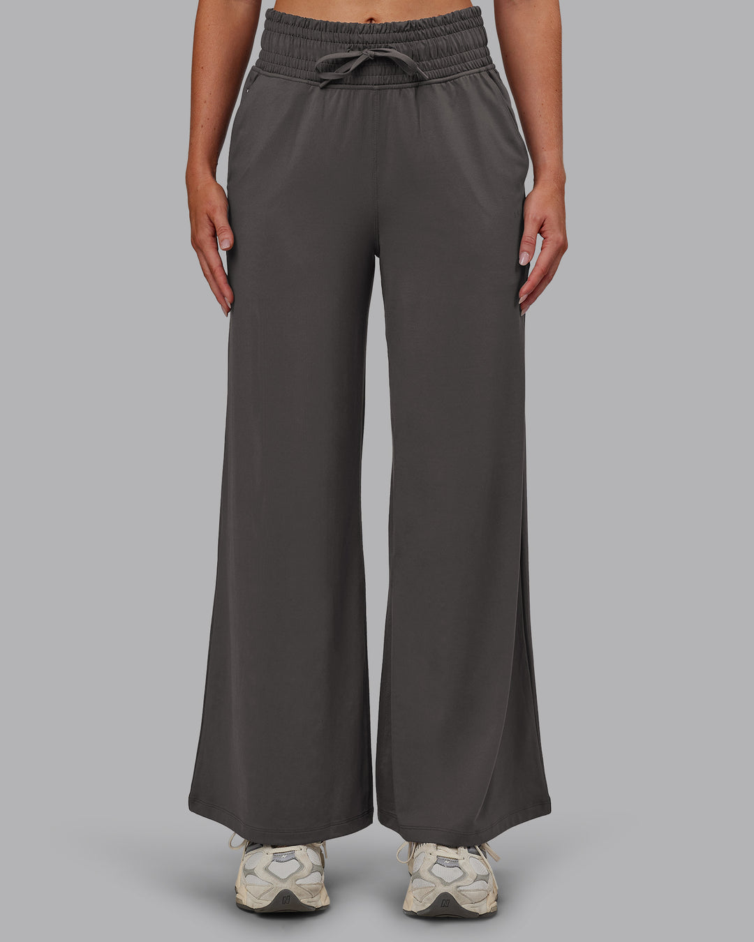 Woman wearing Restore CloudFLX Wide Leg Pant - Dark Storm | Model:Paris | Size:S