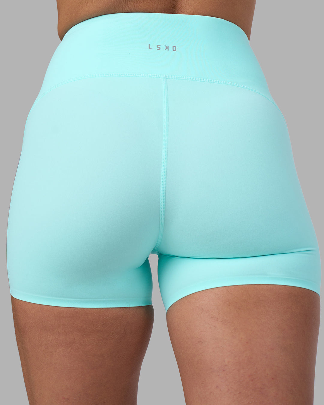 Woman wearing Rhythm Elixir Ultra High-Rise 4" Short - Island Paradise | Model:Sophie | Size:S