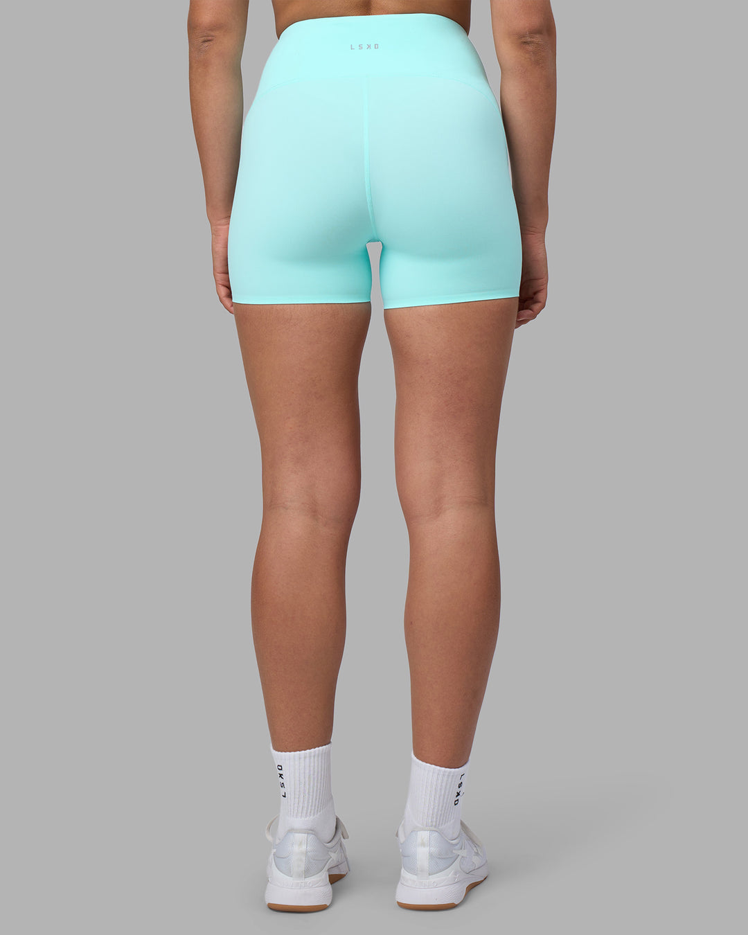 Woman wearing Rhythm Elixir Ultra High-Rise 4" Short - Island Paradise | Model:Sophie | Size:S