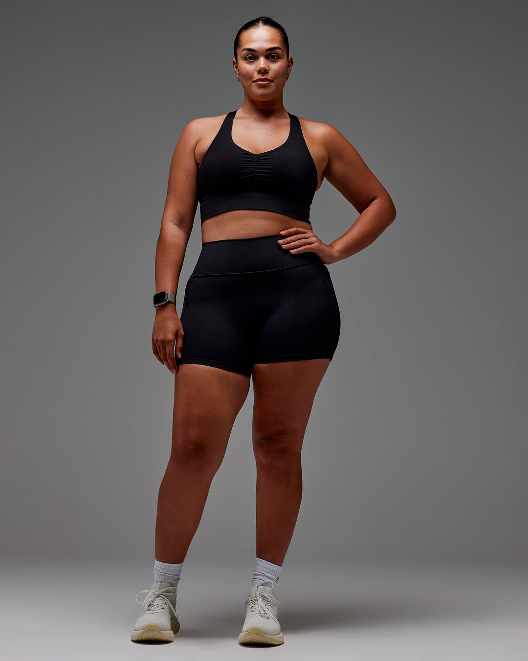Woman wearing Fusion Ultra High-Rise 4" Short Pockets - Black | Model:Aimee | Size:XL