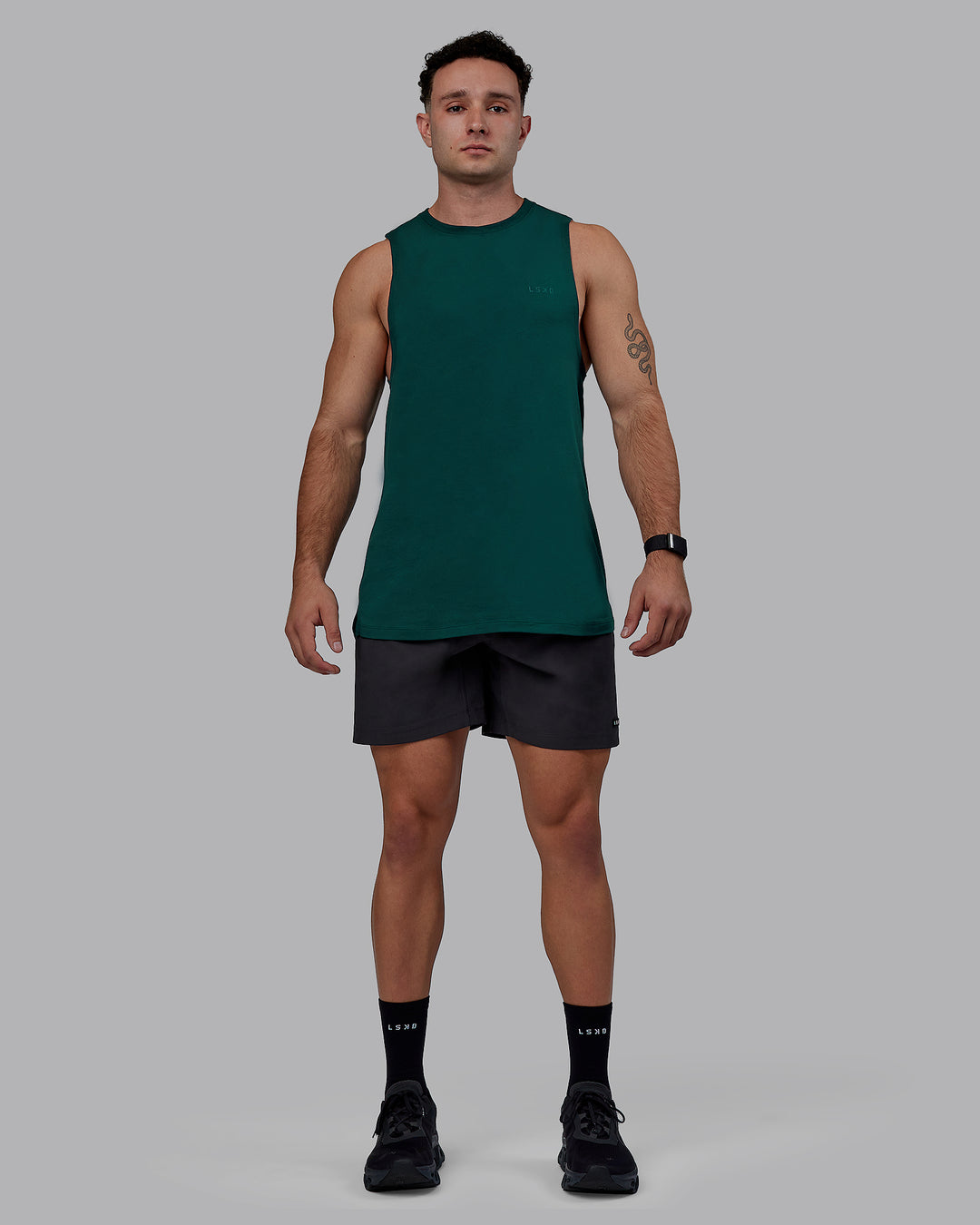 Man wearing Rep 7" Performance Shorts - Pirate Black