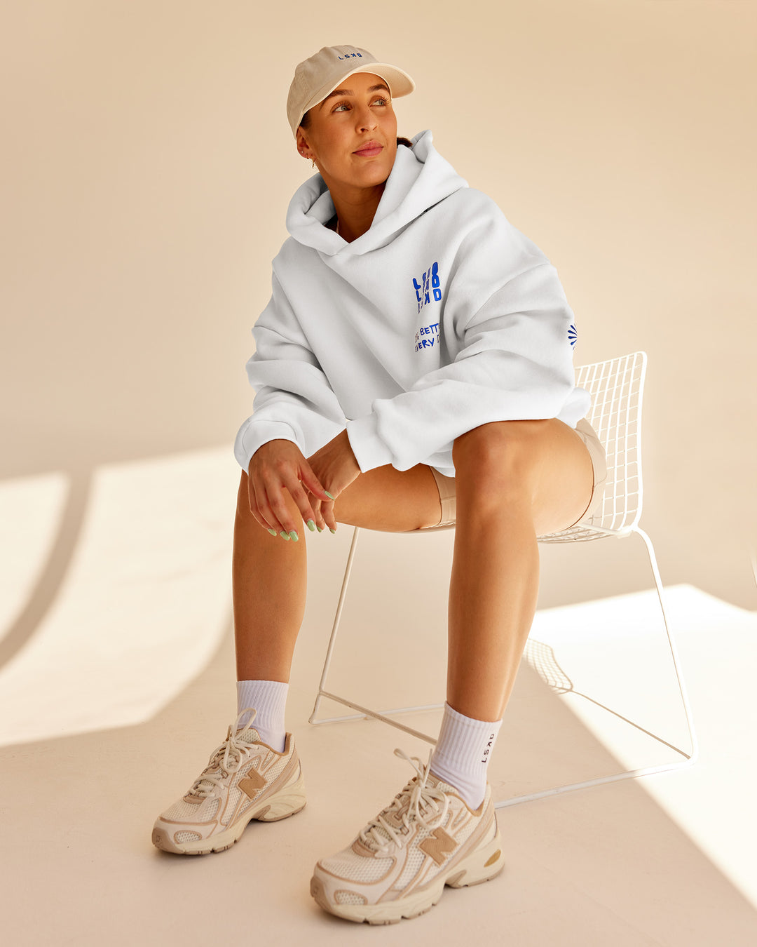 Woman wearing Abs If Not Now When Unisex Oversized Hoodie - Vaporous Gray | Model:Abbey | Size:XS