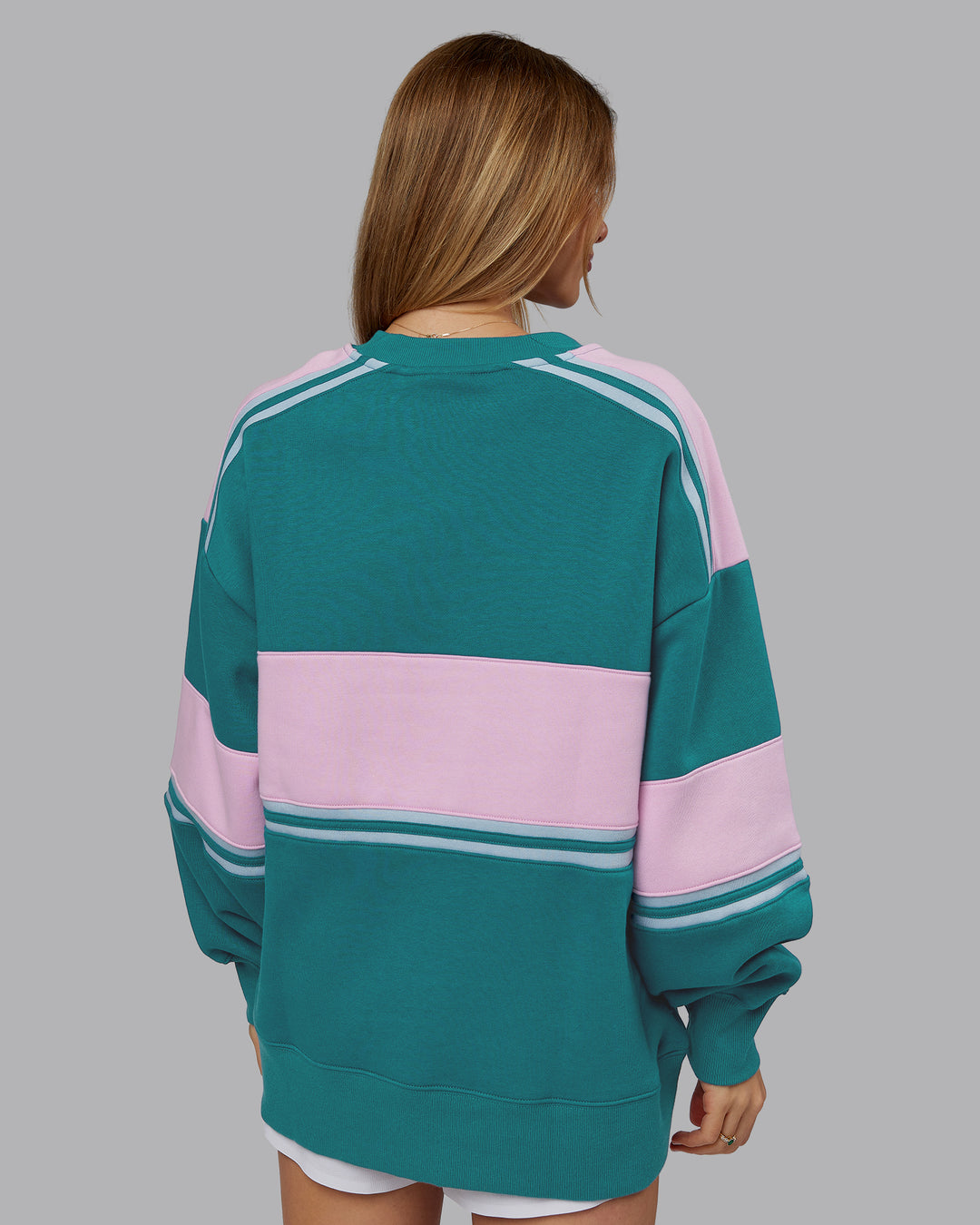 Woman wearing A-Team Sweater Oversize - Blue Coral-Festival Bloom | Model:Emilie | Size:XS