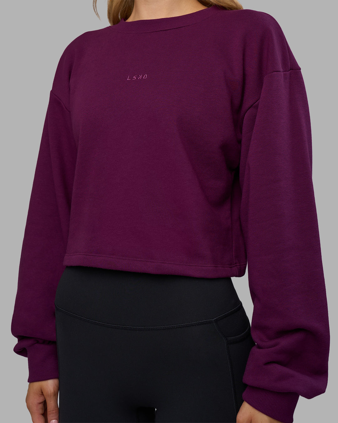 Woman wearing Breeze Open Back Sweater - Plum Caspia-Plum Caspia | Model:Leilani | Size:XS